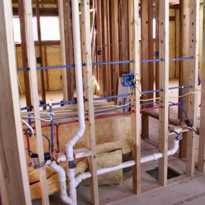Plumbing in a house frame